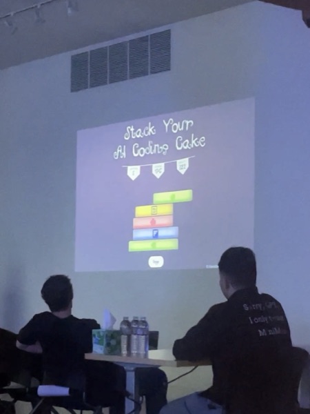 Stack Your AI Coding Cake projected on screen during the CEO’s talk