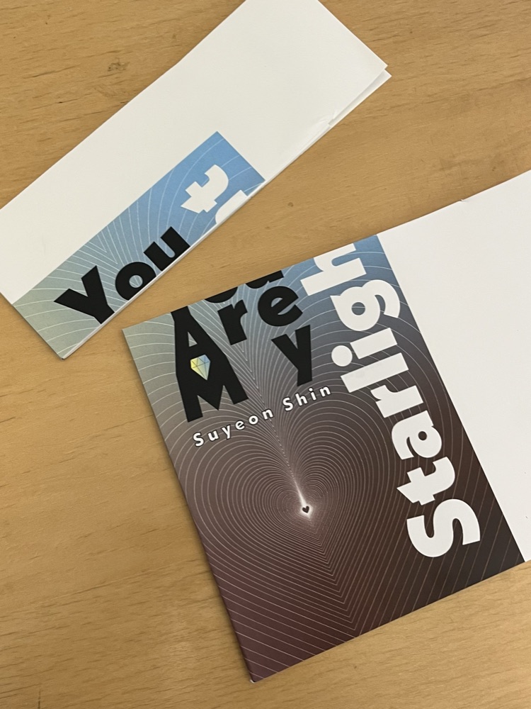 A trial print trimmed in the wrong place, cutting the cover type in half